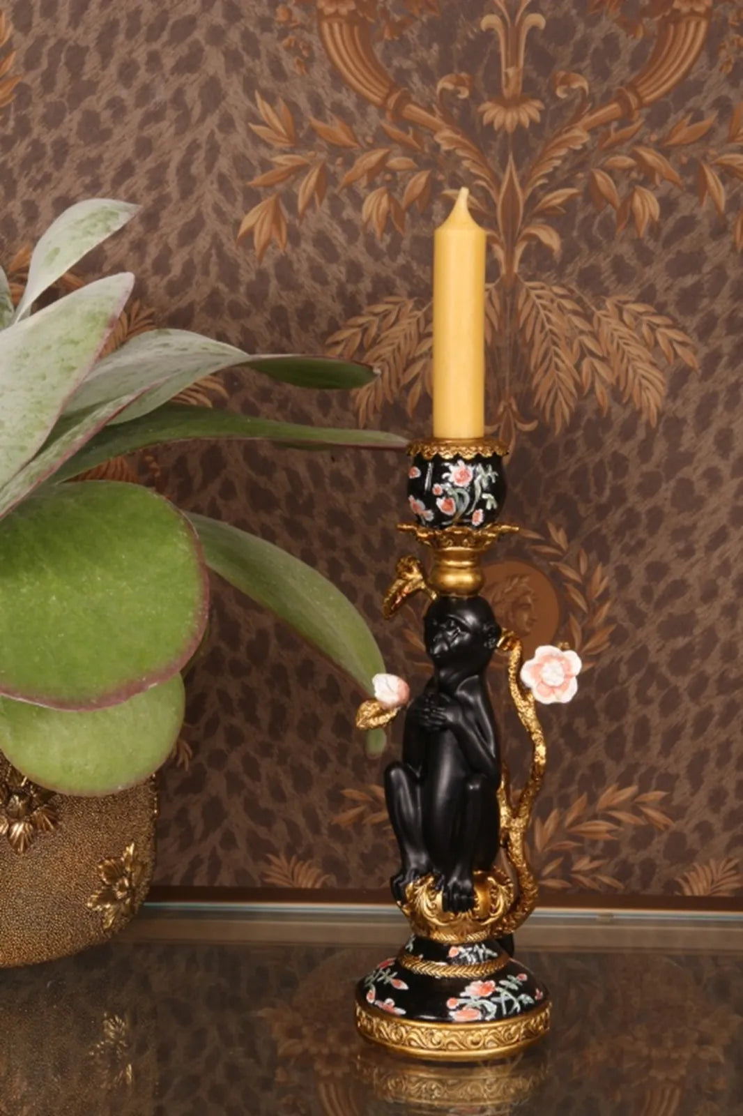 Kertastjaki, api og blóm